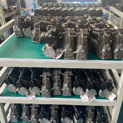 Heavy-duty AC compressors organized on factory tables