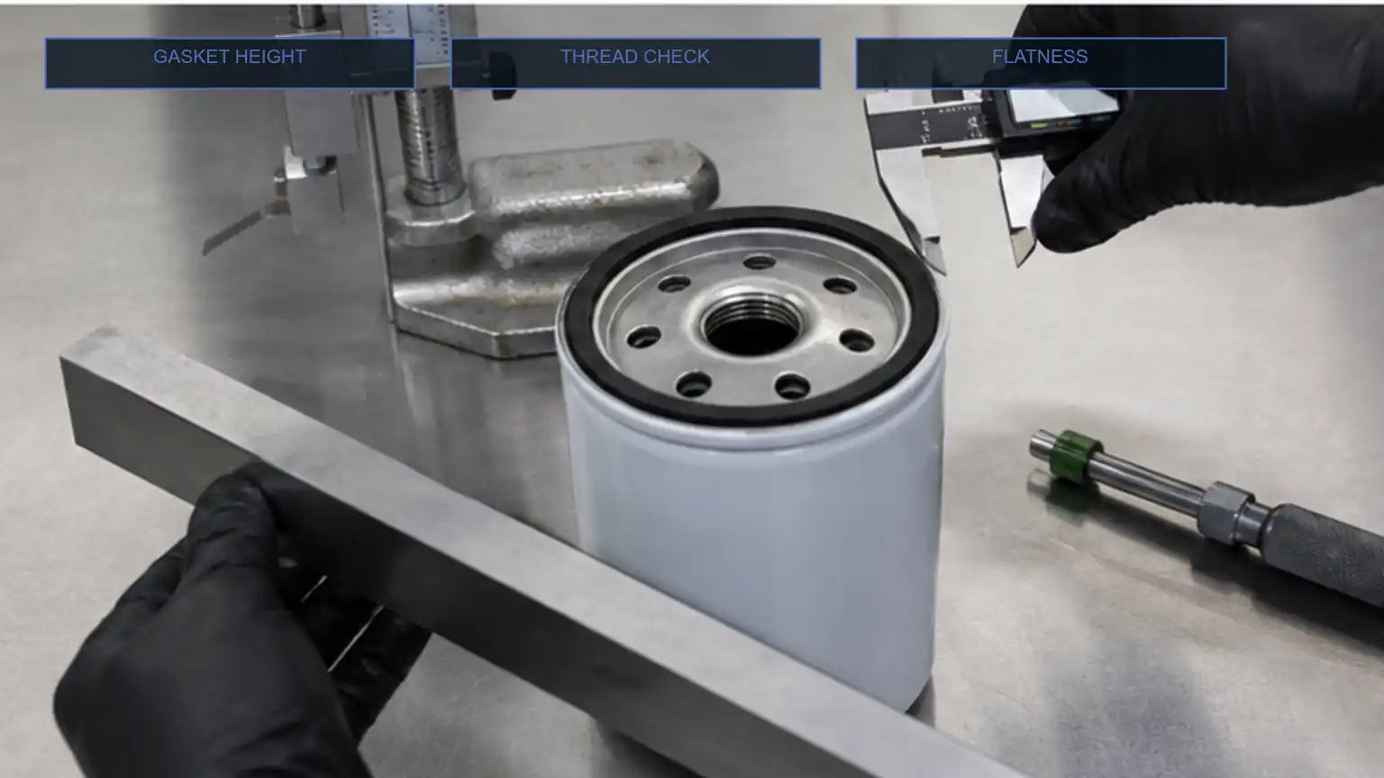 Fuel-filter gasket height, thread engagement, and baseplate flatness checked with gauges and a straightedge.
