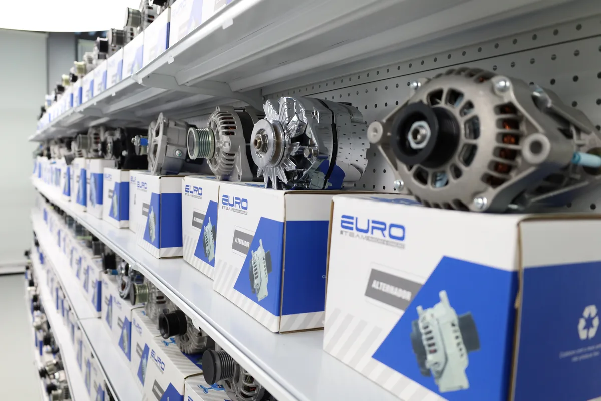 Different alternator assemblies displayed on branded boxes