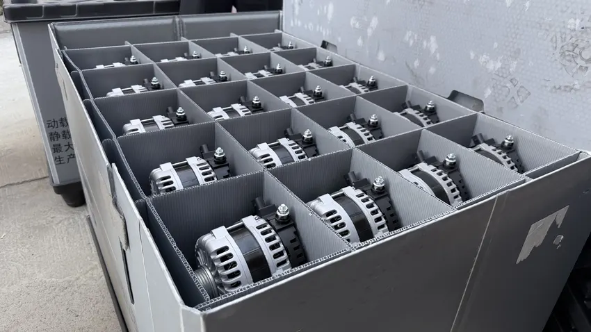 Alternators kept in separate compartments inside a reusable handling container