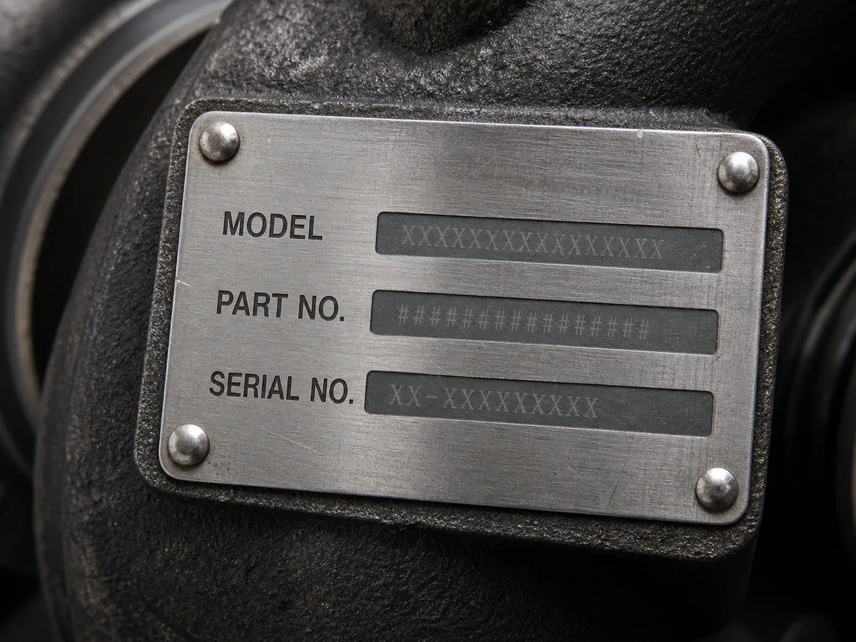 Turbocharger nameplate example with model and part-number identification fields
