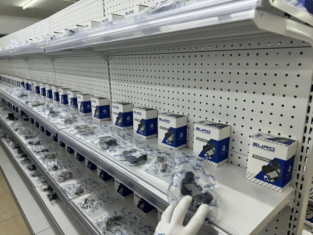 Packaged alternator regulators arranged on a real display shelf
