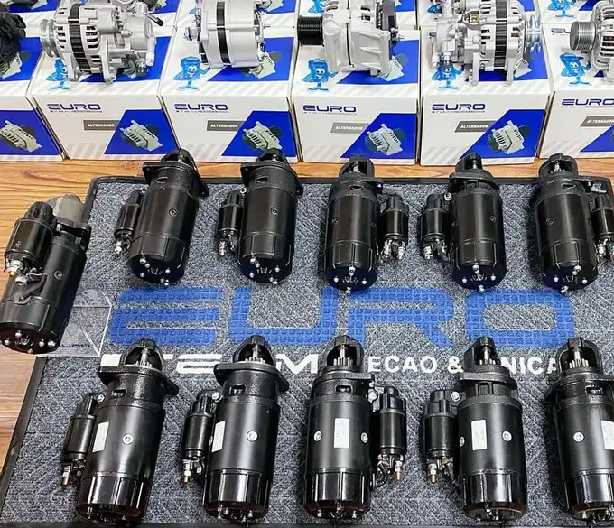 Starter assemblies with different housings, solenoid positions and drive ends in a product display.