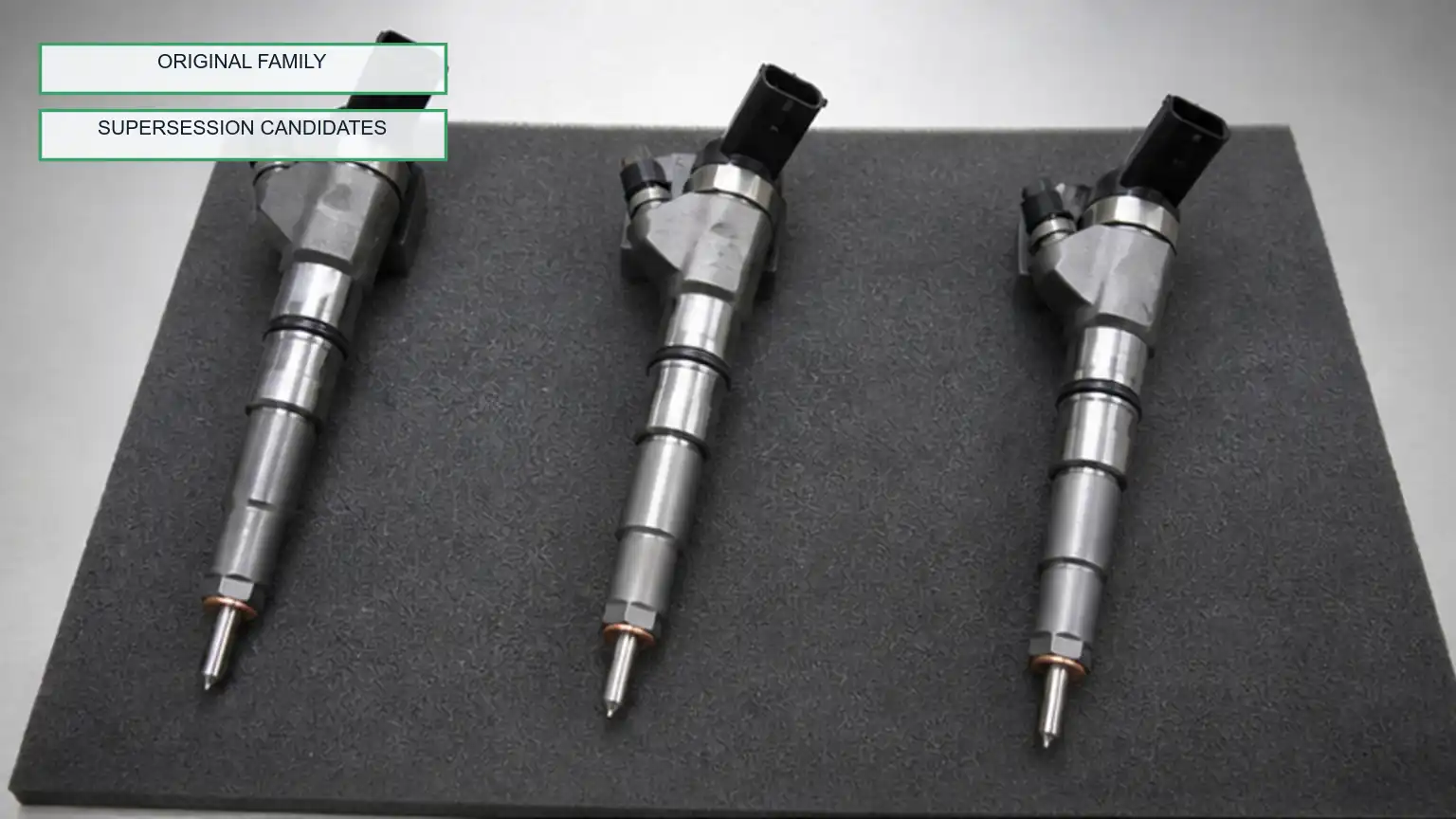 Three visually similar common-rail injectors arranged as supersession candidates on a controlled bench.