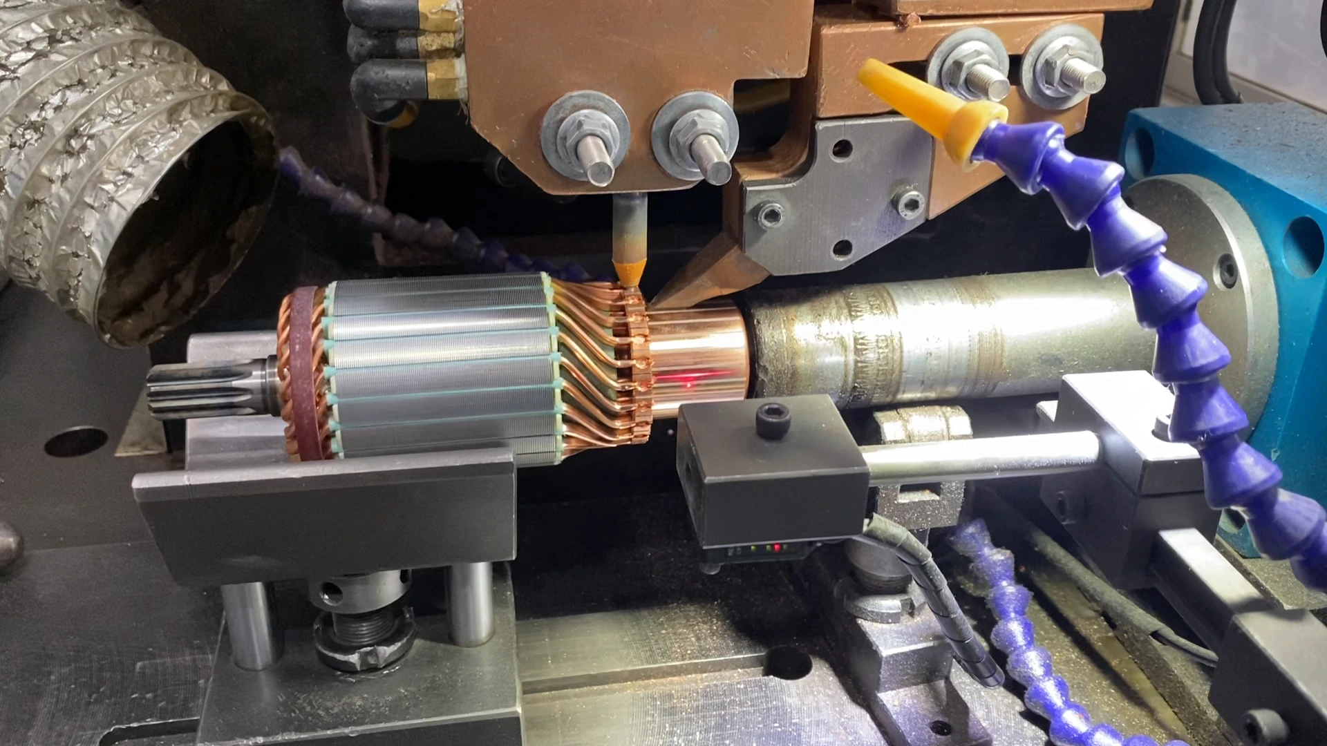 Starter motor armature in a production fixture